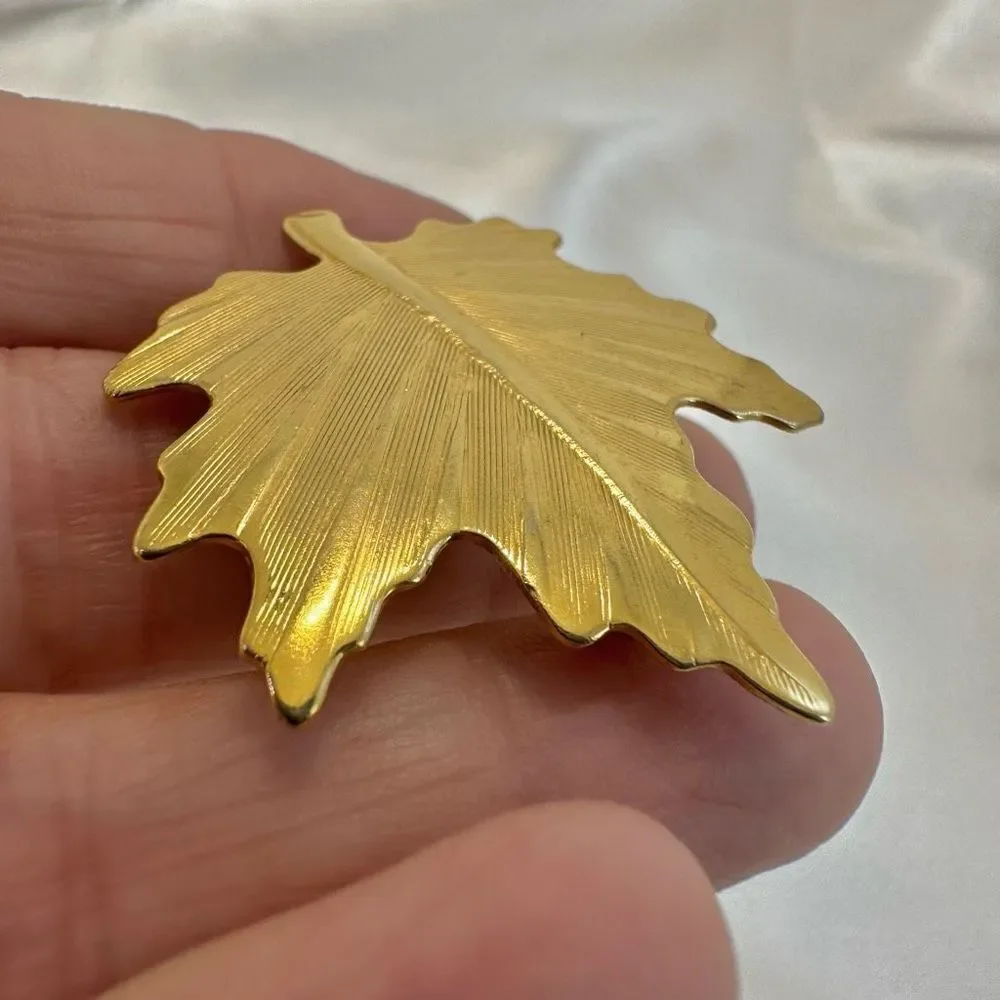 Gold tone leaf pin